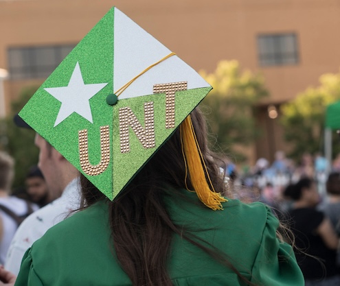 Back of a UNT commencement cap decorated with the UNT battle flag