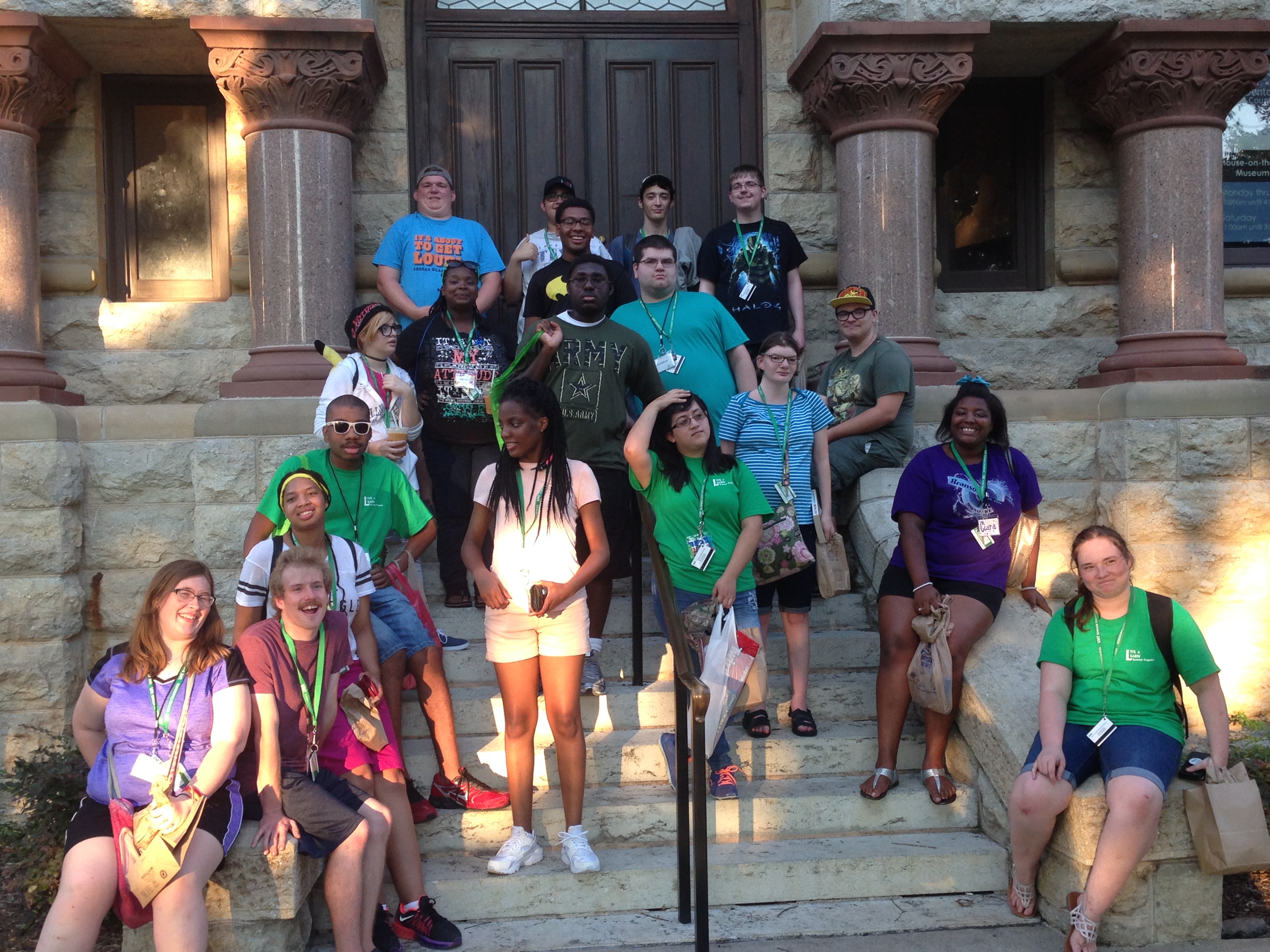 Group of participants on the Denton courthouse steps.